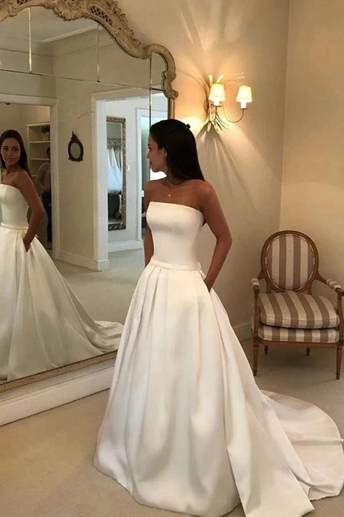 Vestidos de novia largos sin tirantes de satén con corte en A y bola.